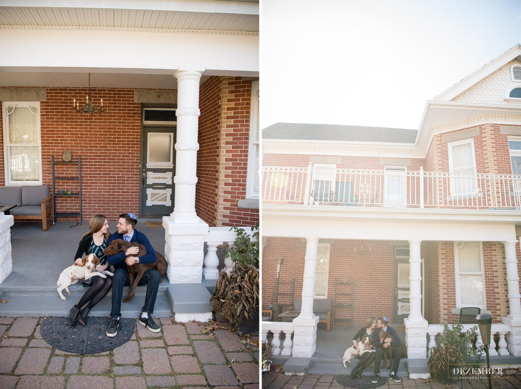 Couple poses with dogs on steps of home