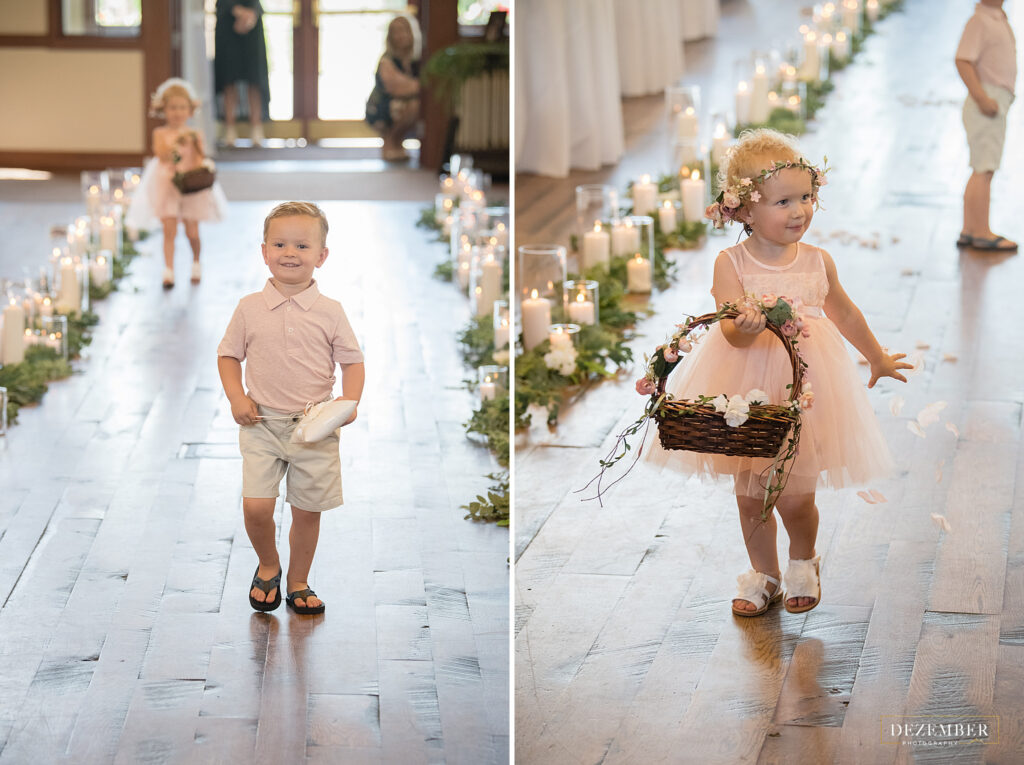 Yung ring bearer and flower girl walk down the aisle