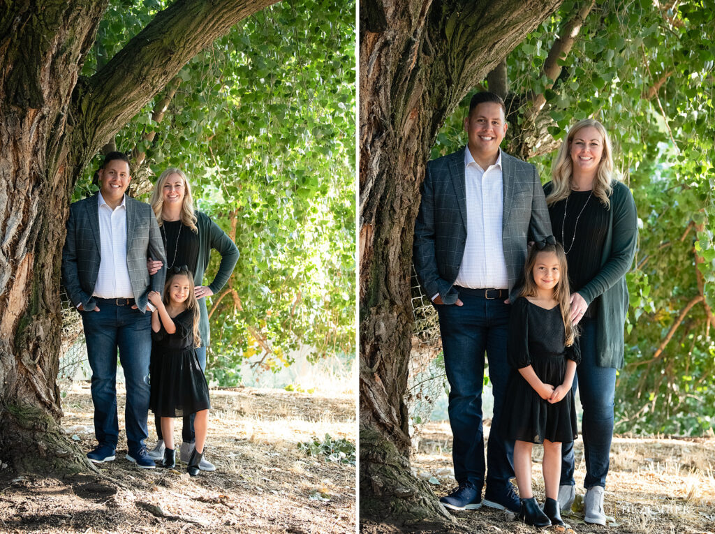 Family poses under big tree