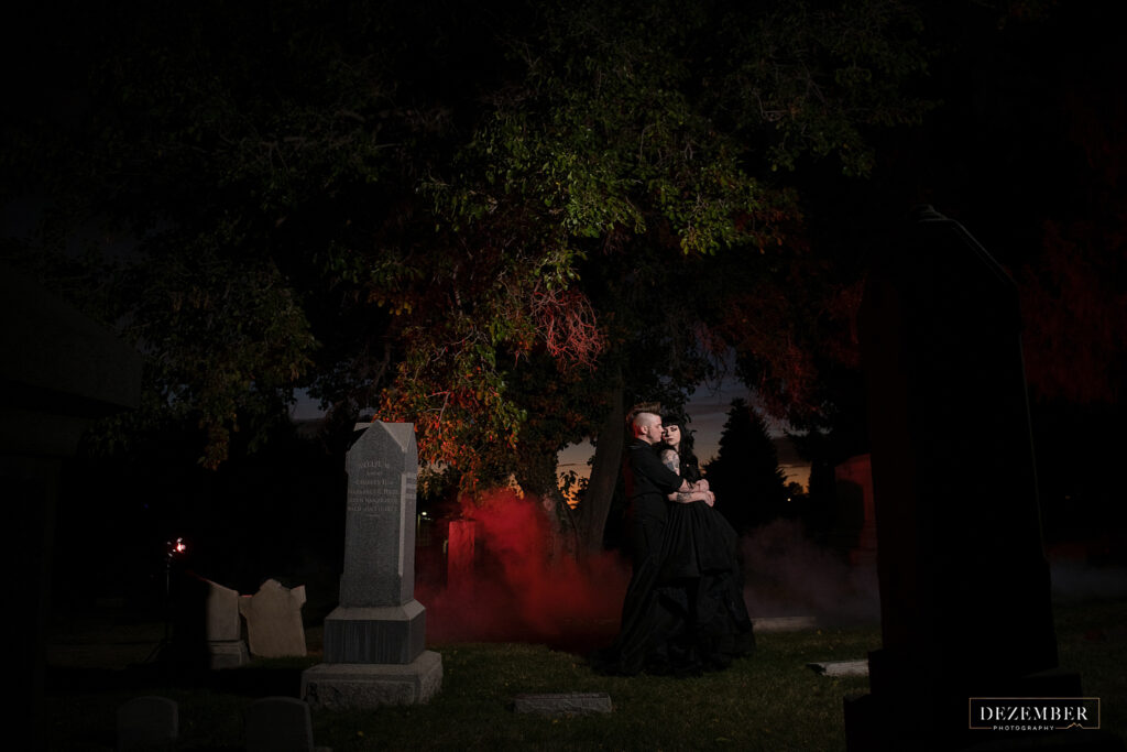 Goth bride and groom in cemetery