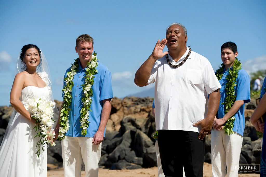 Hawaiian officiant calls out