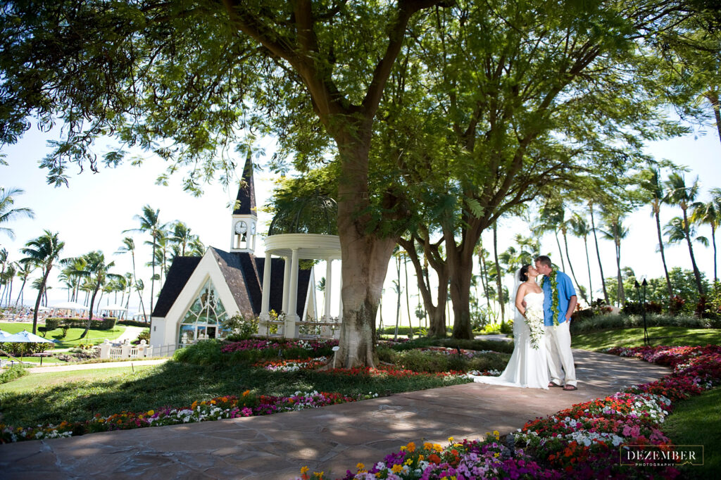 Bride and groom in front of Maui church