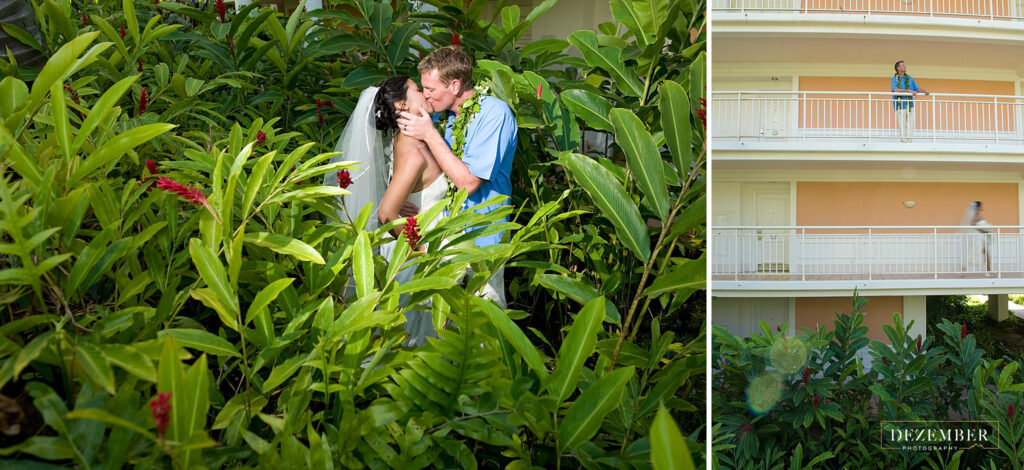 Bride and groom kiss behind tropical flowers