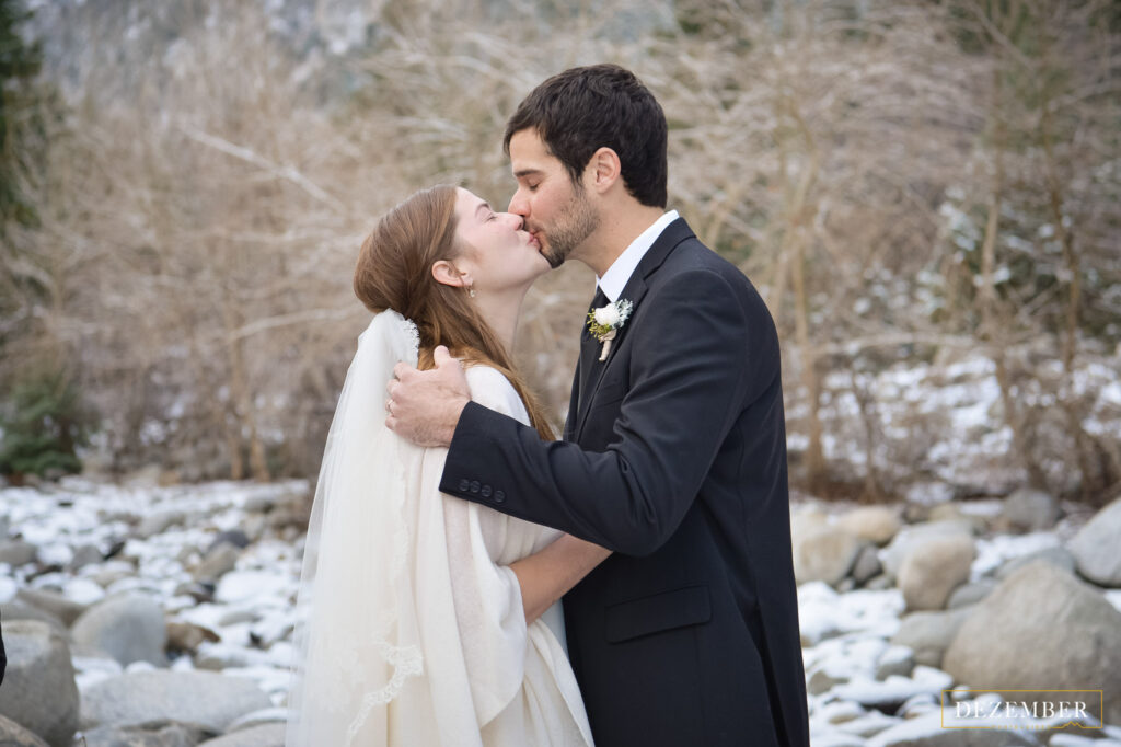 Bride and groom first kiss